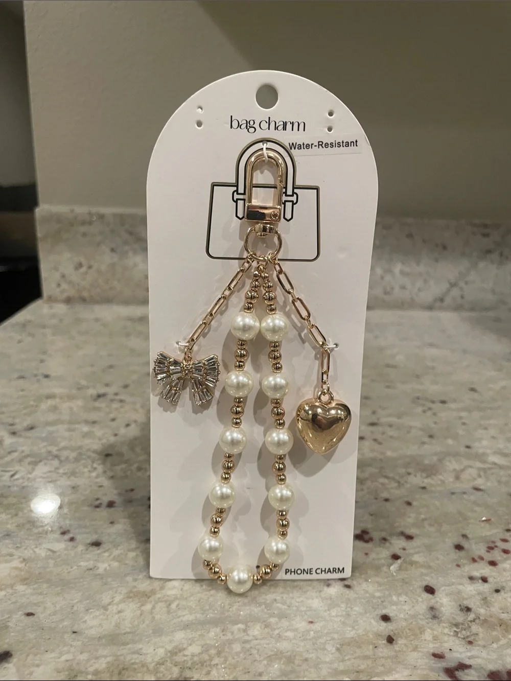 Phone charm/Bag charm: Pearl and gold tone accent w/ crystal bow & heart charm